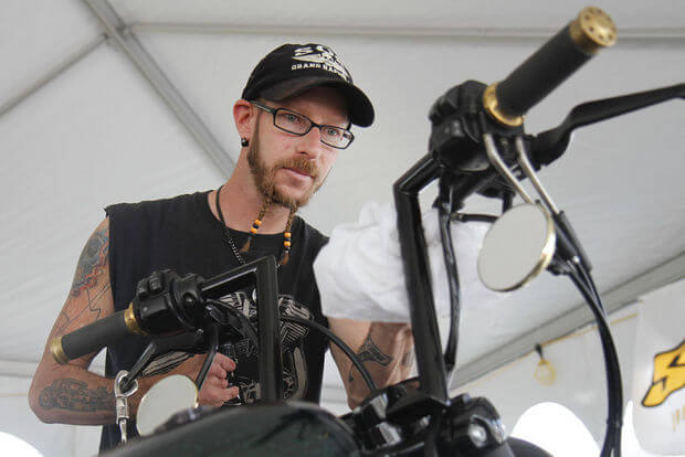 hrhd-x-Chad Plaggemeyer of Grand Rapids cleans his 2010 Harley Davidson Forty-Eight called Sucker Punched