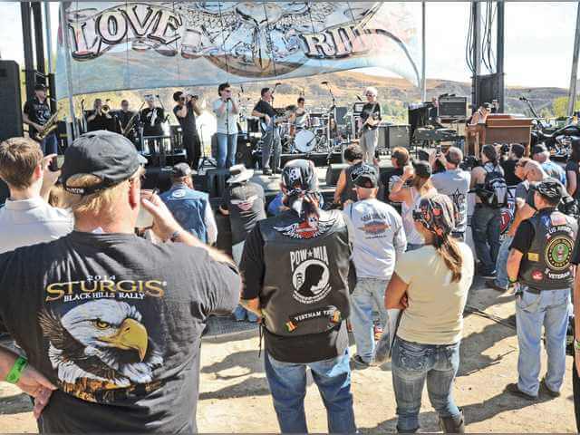 Motorcycle enthusiasts watch Robby Krieger and his band Jam Kitchen perform on stage at Love Ride 31 at Castaic Lake on Saturday. Signal photo by Dan Watson