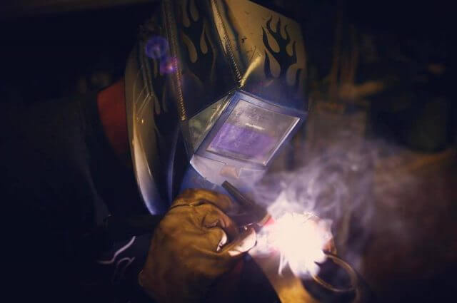 Air Force Veteran, David Roy of @vuduvintage, laying down some welds on the gas tank